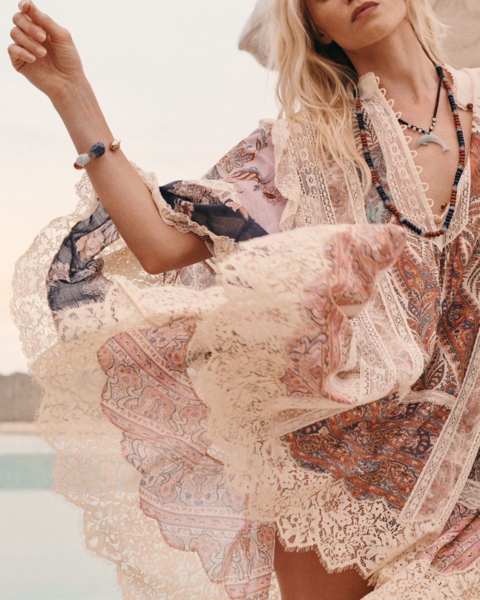 Flowing forms detailed with intricate lace. ​

The Rhiannon Billow Mini Dress. Discover Summer Swim &gt; with-zim.com/X-Summer-Swim-…