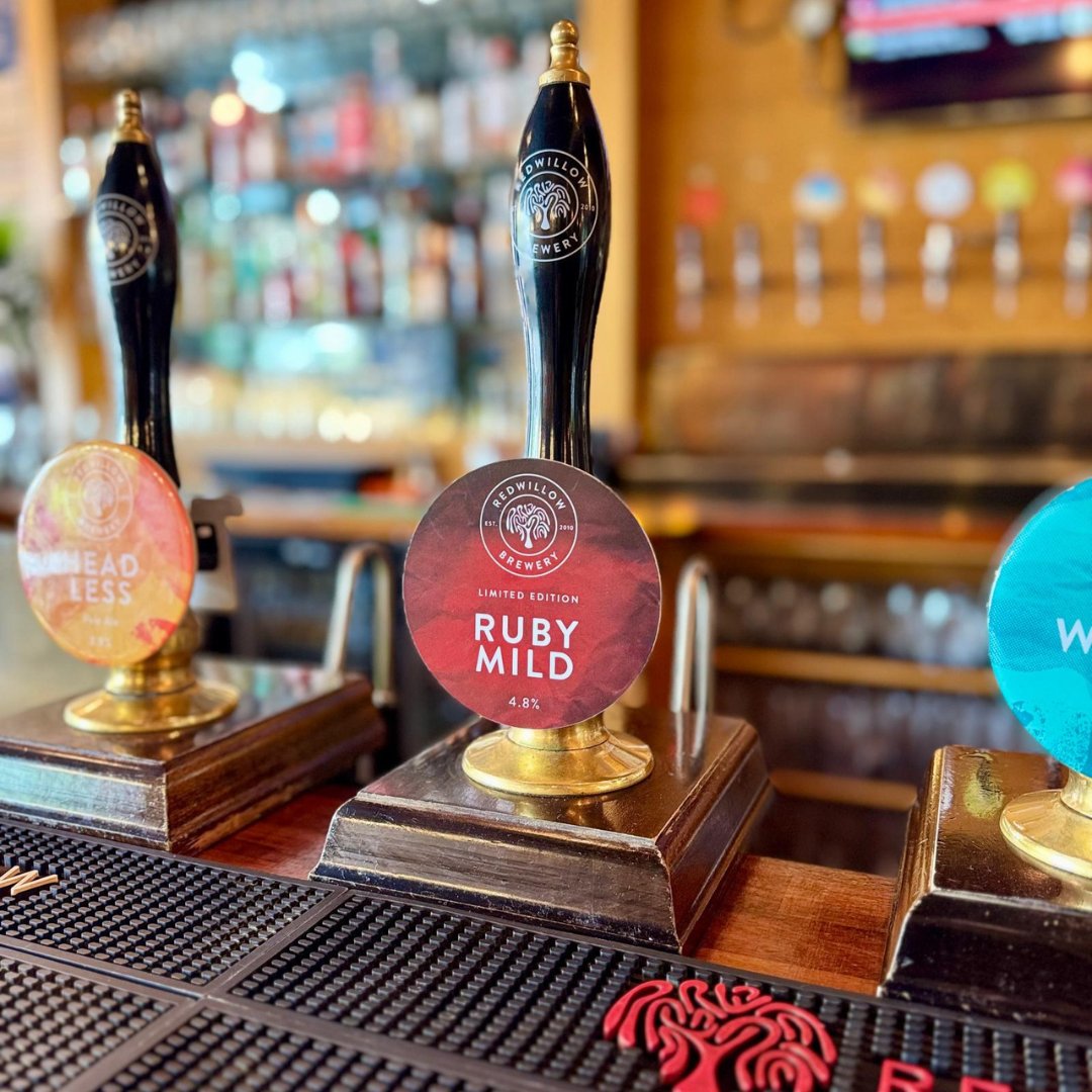 Open from midday today!

Now pouring - Ruby Mild

A classic Ruby Mild. A rich, smooth, and rounded body with notes of sweet dried fruit, light caramel and hazelnut. The moreish finish leaves only one option, another pint!