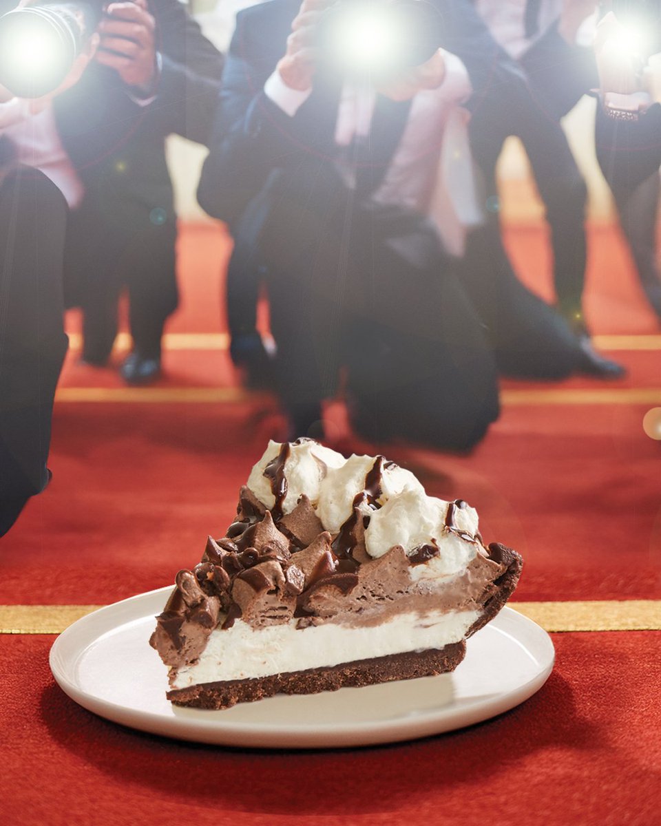 EDWARDS® Chocolate Crème Pie is wearing chocolate drizzle, chocolate chips, and whipped crème rosettes.  Of course, it always looks this good – no gala required!