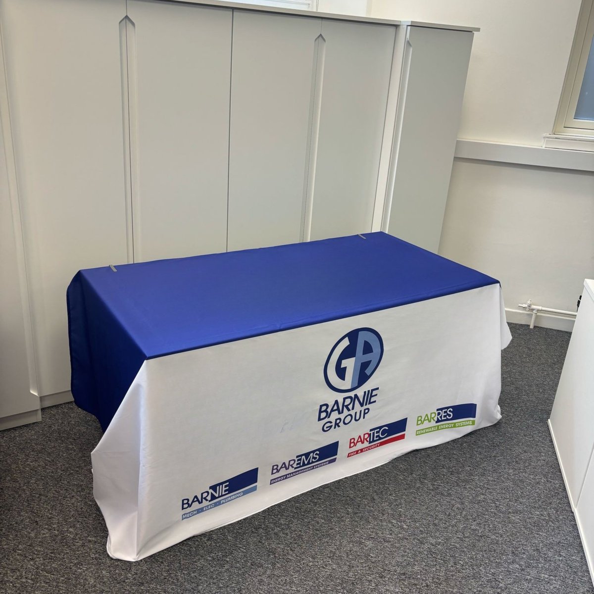 Delighted with the quality and finish of this table cloth for G A Barnie Group Ltd, perfect for any upcoming events! 💙

If you're looking to create a fully branded setup, get in touch – we'd love to help!

📧 design@adderbusiness.co.uk