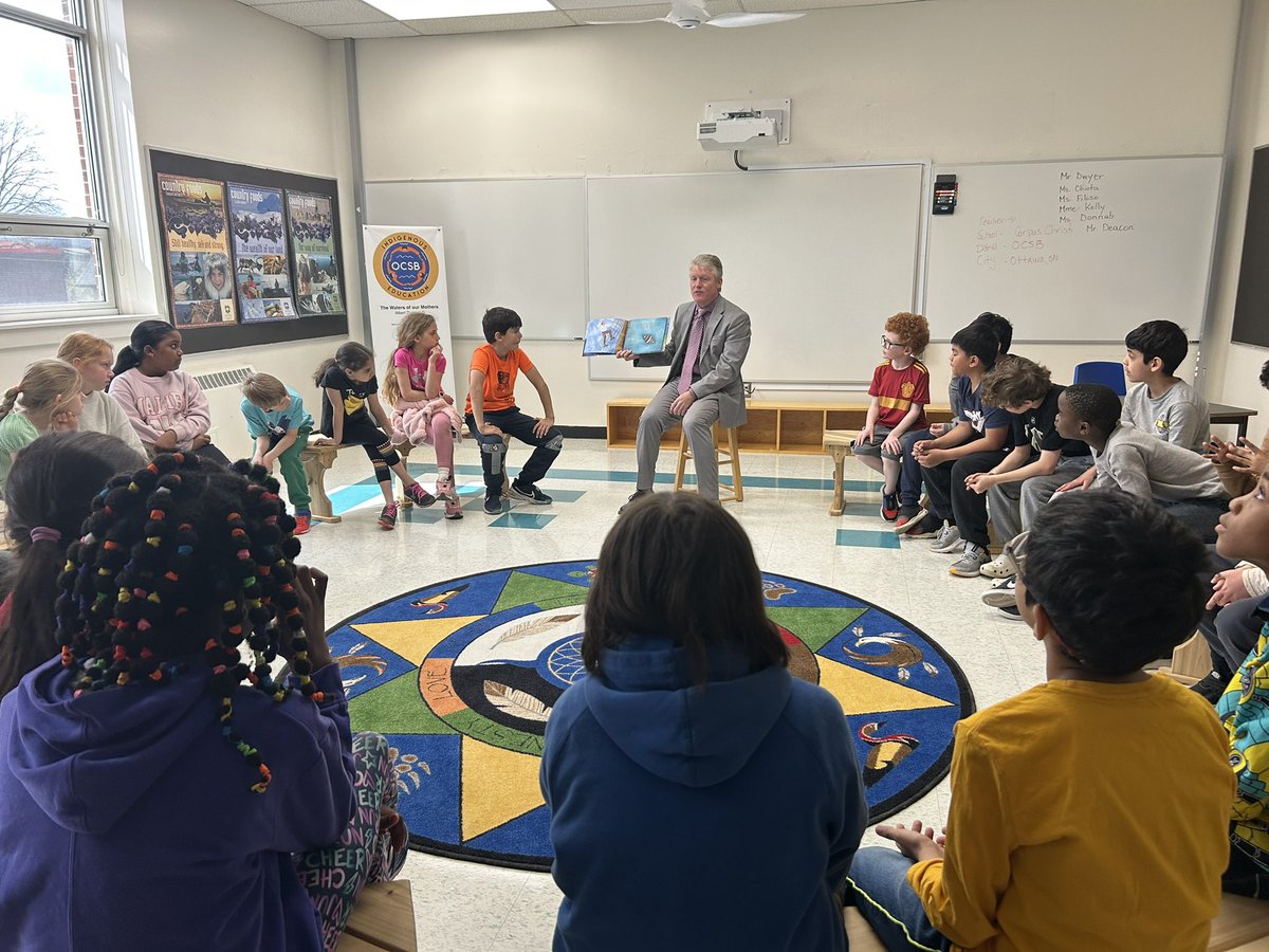 Did you guess our Mystery Reader? We welcomed Mr.Kelly and listened to an Indigenous story called Encounter. We discussed and listened to the story in our Indigenous classroom. Thank you Mr.Kelly for taking time to read to us!! #educationweek <a href="/OttCatholicSB/">Ottawa Catholic School Board</a> <a href="/CorpusOCSB/">Corpus Christi School</a>