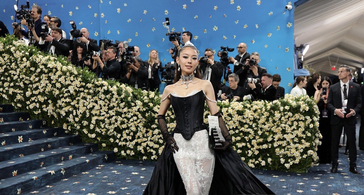 I’m in every picture but no one notices that’s me going up the stairs dressed as a hedge covered in flowers.