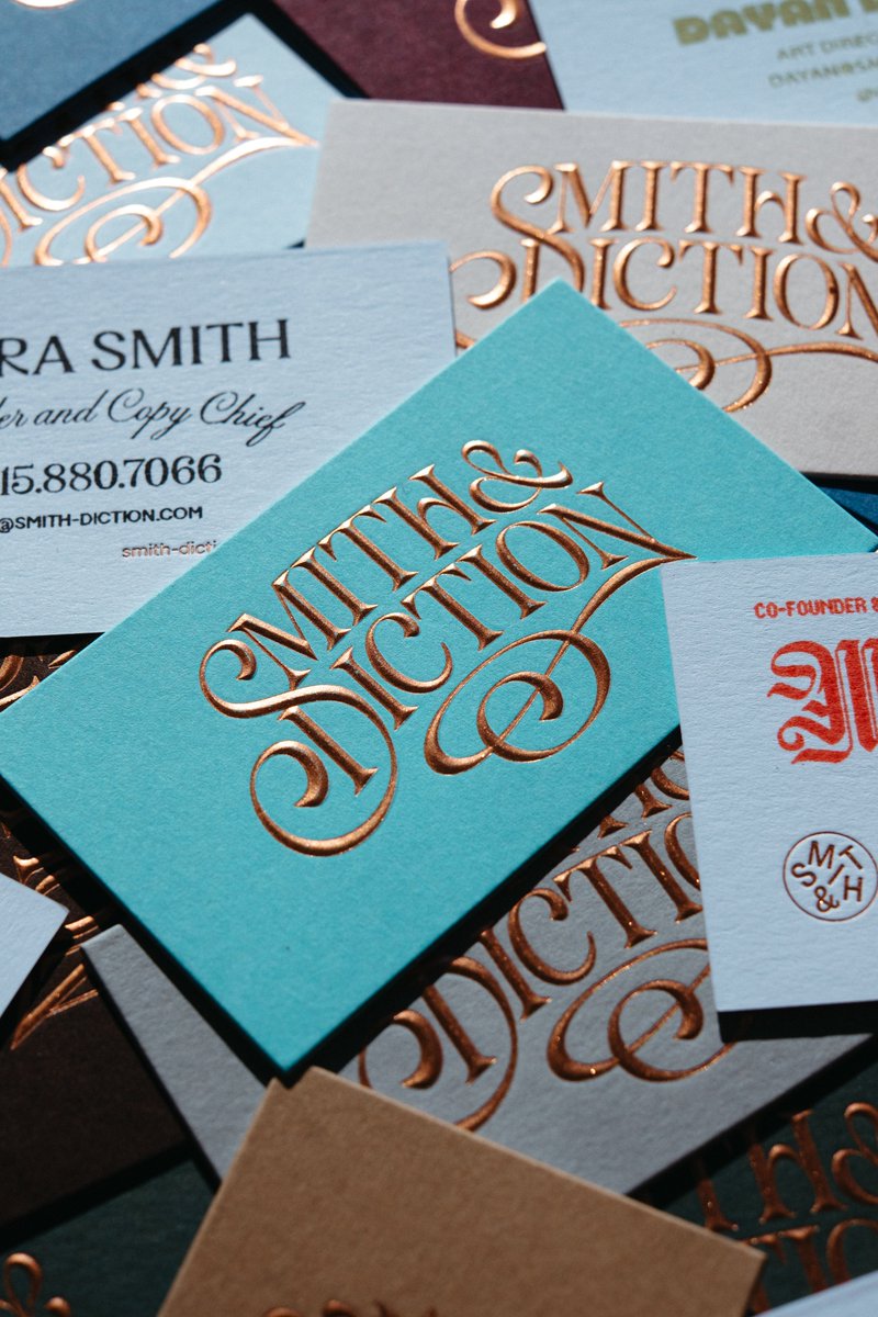 I'm so so excited that these new cards got finished just in time for #Config2025!!

I wanted to have cards that showed the entire teams different personalities so we got a beveled, foiled letterpressed front &amp; then blank backs so everyone could stamp on their own custom designs.