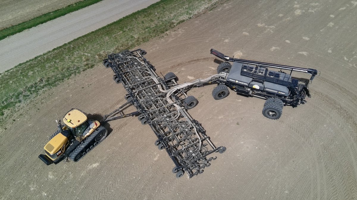 In Enchant, AB today. Wheat going in with a SeedMaster E860 cart and new 7012 SMS Single Knife with BTT paired row openers. Special thanks to Curtis and Mitch at Alberta AG Centre Coaldale for arranging this!
