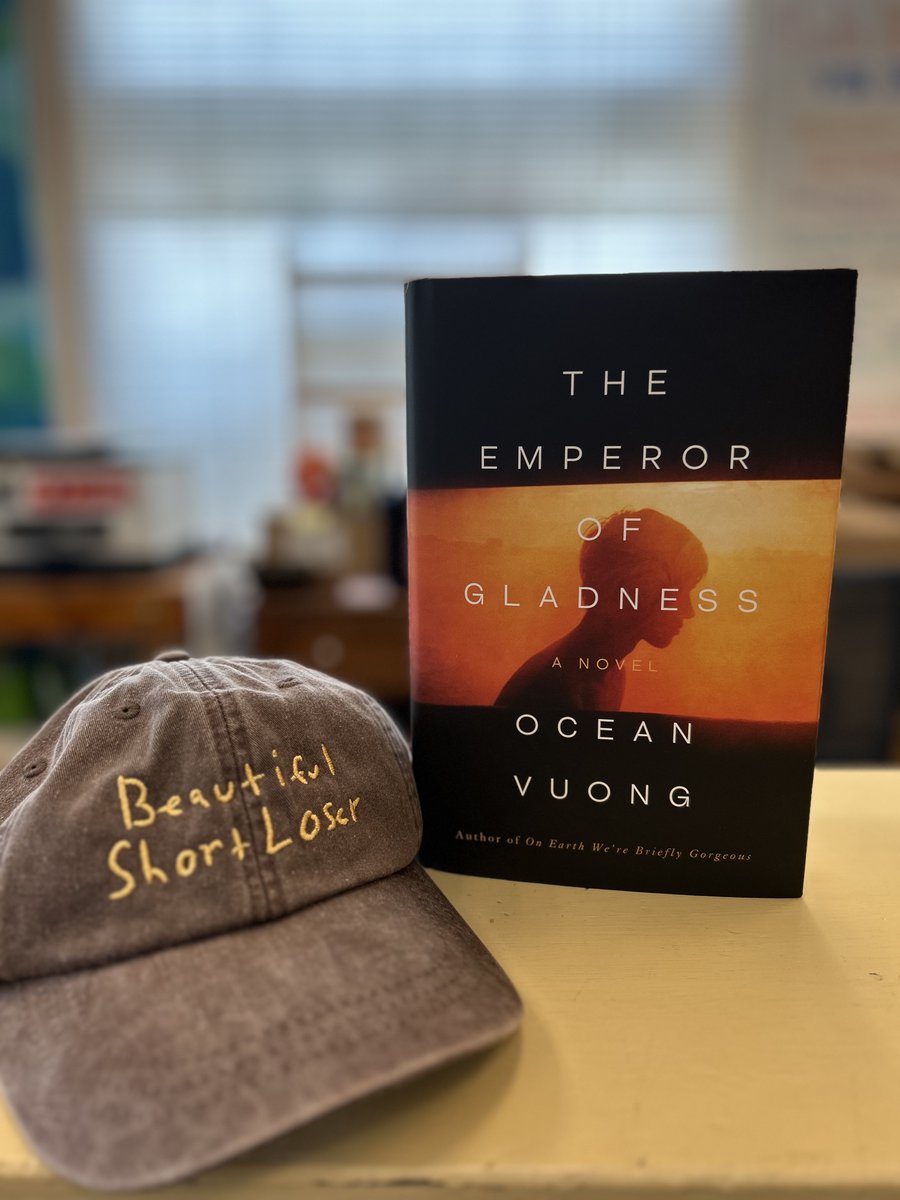 We're so excited for Ocean Vuong's new book, The Emperor of Gladness that we've teamed up with Penguin Press to give away away this fun hat to the first person who picks a copy in the store!