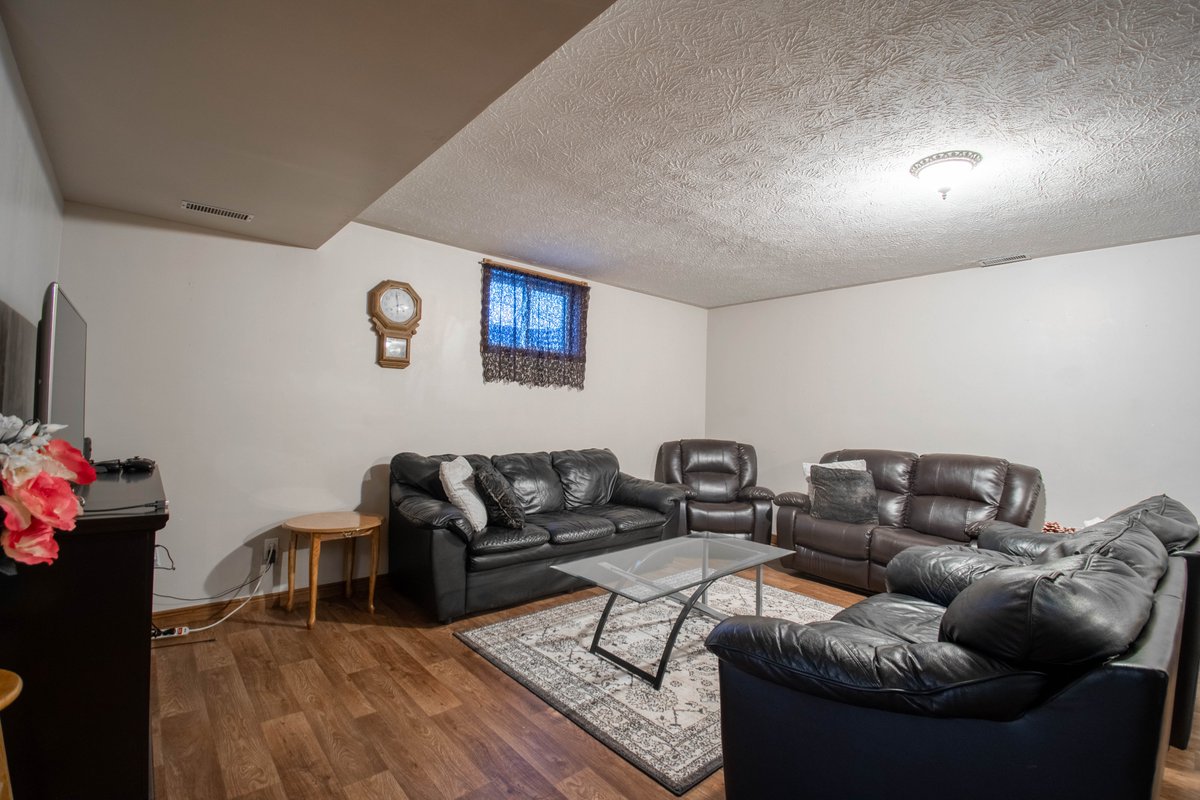 This peaceful country property boasts numerous features, including a spacious brick ranch home with an attached garage and finished basement. This inviting property has a large lot with scenic country views, an insulated shed, and a heated workshopand much much more!