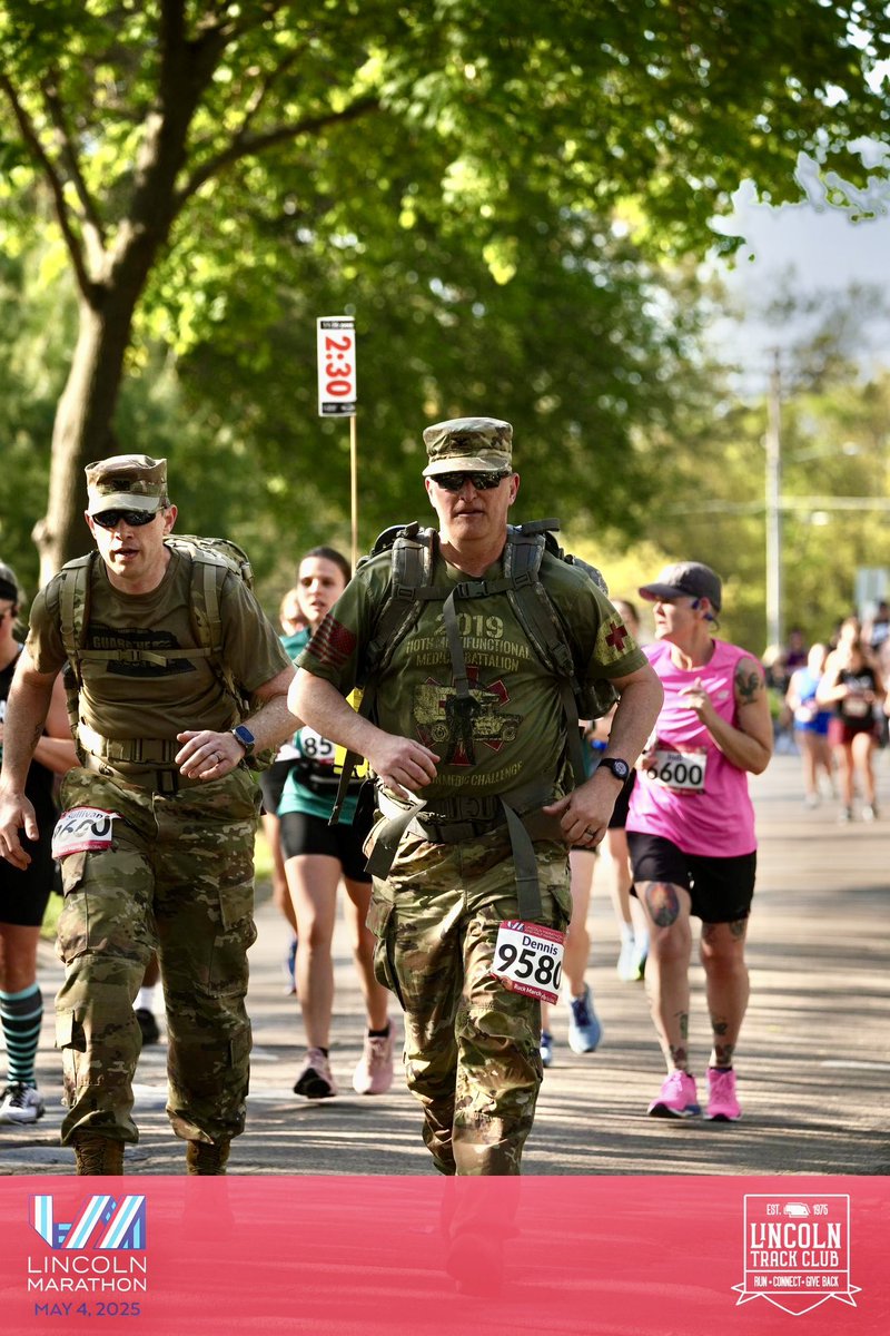 rdennisjr's tweet image. Pretty rare that I find race photos I like of myself. This year the Lincoln half brought two! Love this shot of COL Sullivan and myself pushing hard around ten miles in. Life is always interesting when pushing limits with friends! #goguard #arng #ageisjustanumber