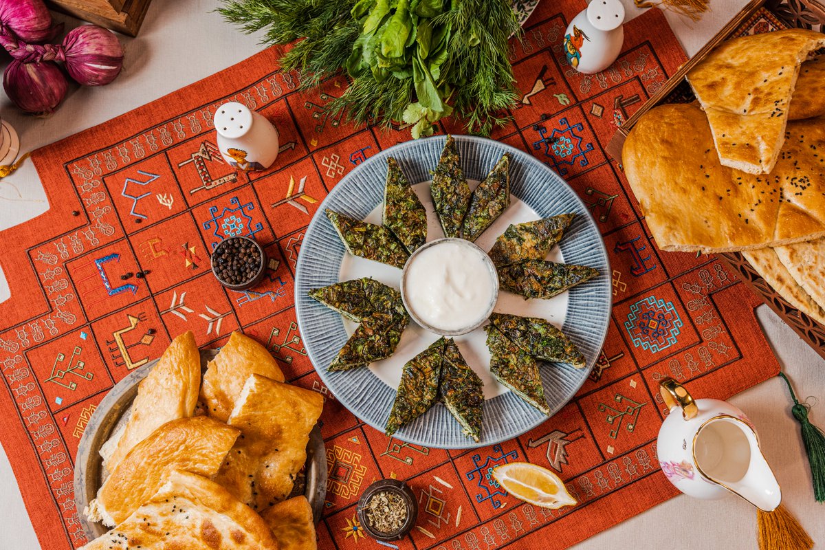 🌿 Kuku – Azerbaijan’s green treasure!

This fluffy herb-filled omelette isn’t just delicious—it’s a taste of spring on your plate 🌱 Perfect for breakfast or brunch, kuku symbolizes renewal and nature’s awakening. Served hot or cold, with yoghurt or on plov, it's a must-try bite