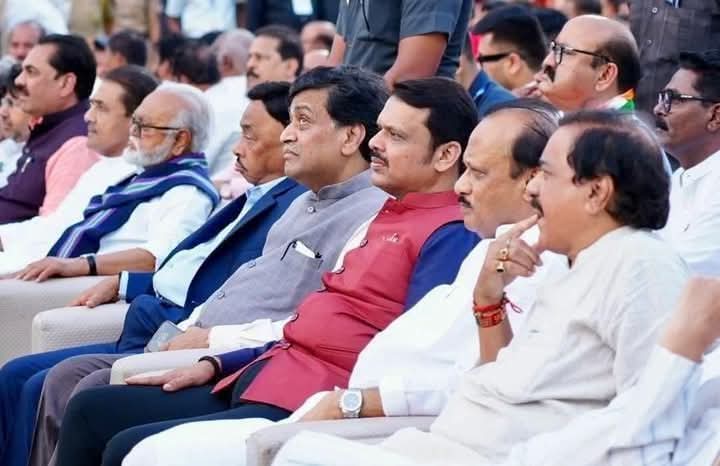 The one sitting in the middle? Yeah, he had once accused everyone around him of corruption—must be exhausting keeping track of his own plot twists.