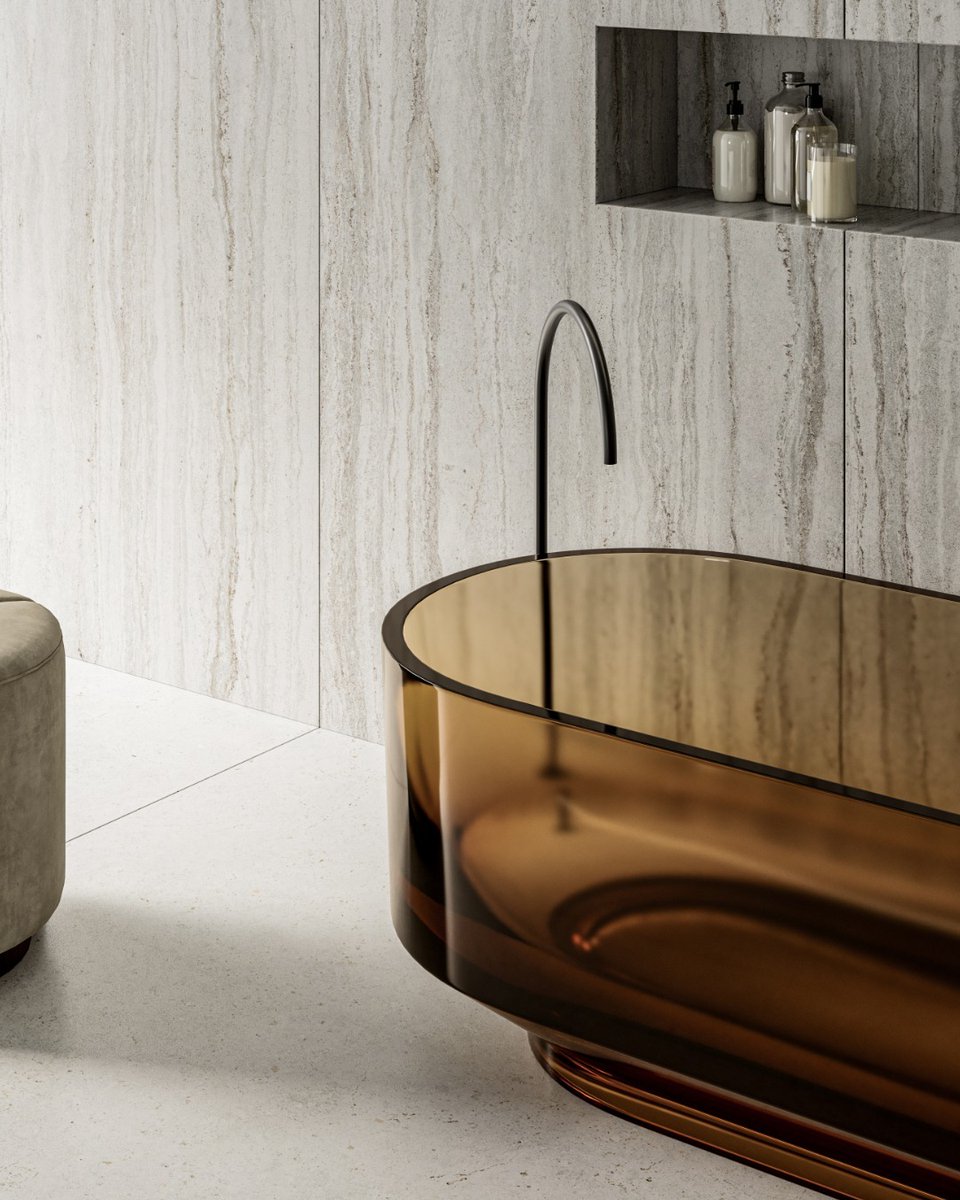 Timeless elegance with Dekton Trevi. Marble-inspired beauty meets innovation for a sophisticated, durable bathroom. Its creamy base with gray and blue veins adds character and distinction.