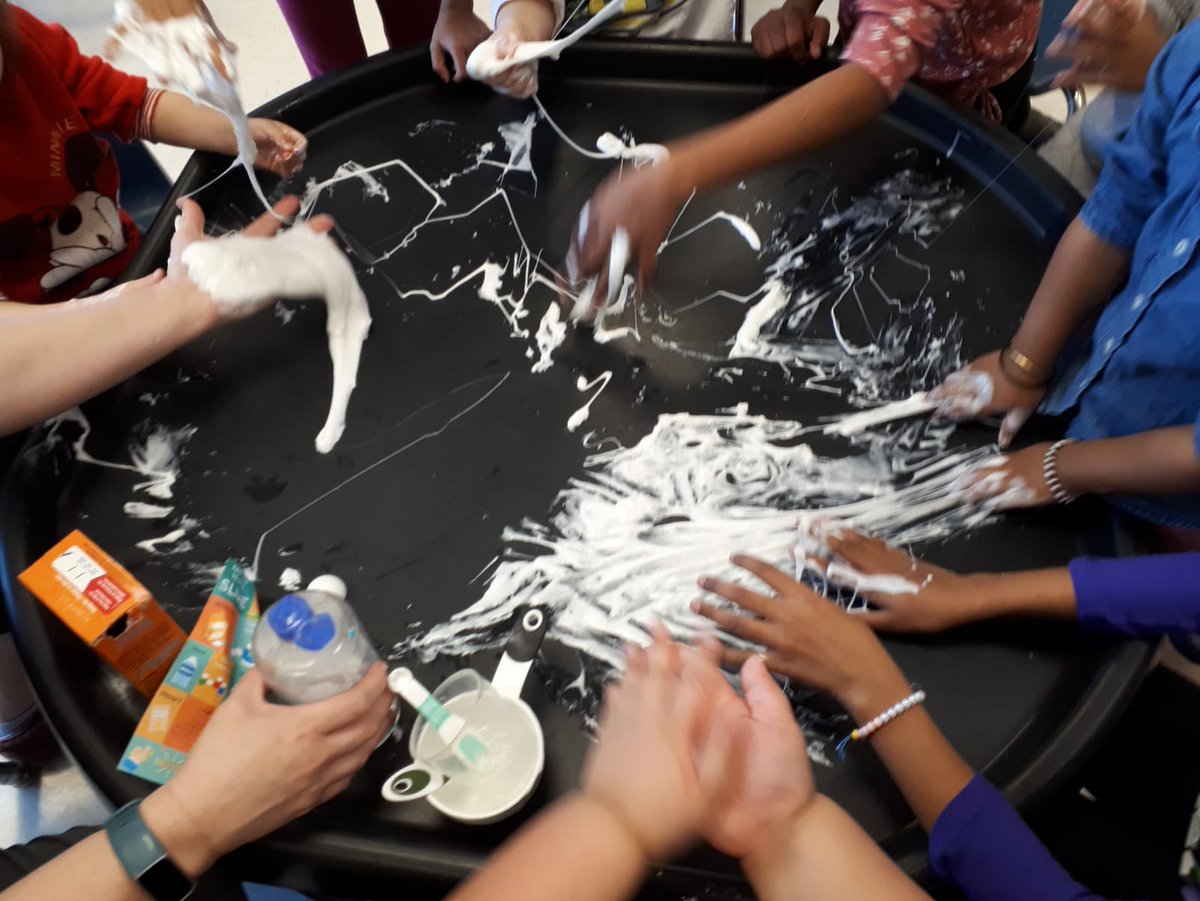 Sensory fun at EarlyON Markham Gateway!  Families mixed glue, baking soda, contact lens solution &amp; water—stretching, squeezing &amp; creating together!
Children showed great self-regulation &amp; communication skills. Sensory play builds brains &amp; sparks creativity!