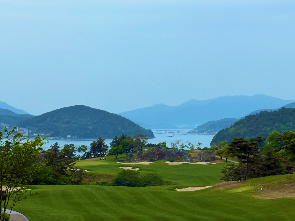 Top100Rick's tweet photo. South Cape Owners Club
Kyle Phillips - 2013 
Namhae, South Korea 

Truly one of the most epic places you could play golf on our globe, South Cape is a treat for all the senses. 

This luxurious resort has it all. But this post will be about the golf course, not the perfection that is everything else. 

The course is cut into rugged cliffs along the sea, certainly an engineering and routing challenge from the beginning. Kyle did an amazing job finding a playable golf course. 

The sea holes steal the show. The 3 par 3’s on the water are all world class. It’s rare for an ocean course to allow you to play over the actual ocean multiple times. 

You can see the ocean from the entire course, but you’d be amiss to think it’s just the views that are interesting. The golf holes are fun and strategic, with plenty of risk and reward awaiting. Aesthetically Kyle did his typical great job with the visuals.

The greens are fun with lots of slopes and run offs. The constant rock outcroppings provide wonderful visuals and sometimes they are in play.

The only thing missing is firm turf, which I imagine is a struggle with this mountain soil, it’s the only thing keeping it from competing with the greatest seaside courses of the world.

Cape Owners is a fantastic course and the epic heroic shots you take you will remember forever. IMO it’s a top 100 world level 18 holes and truly a trek worth making. A magical place!