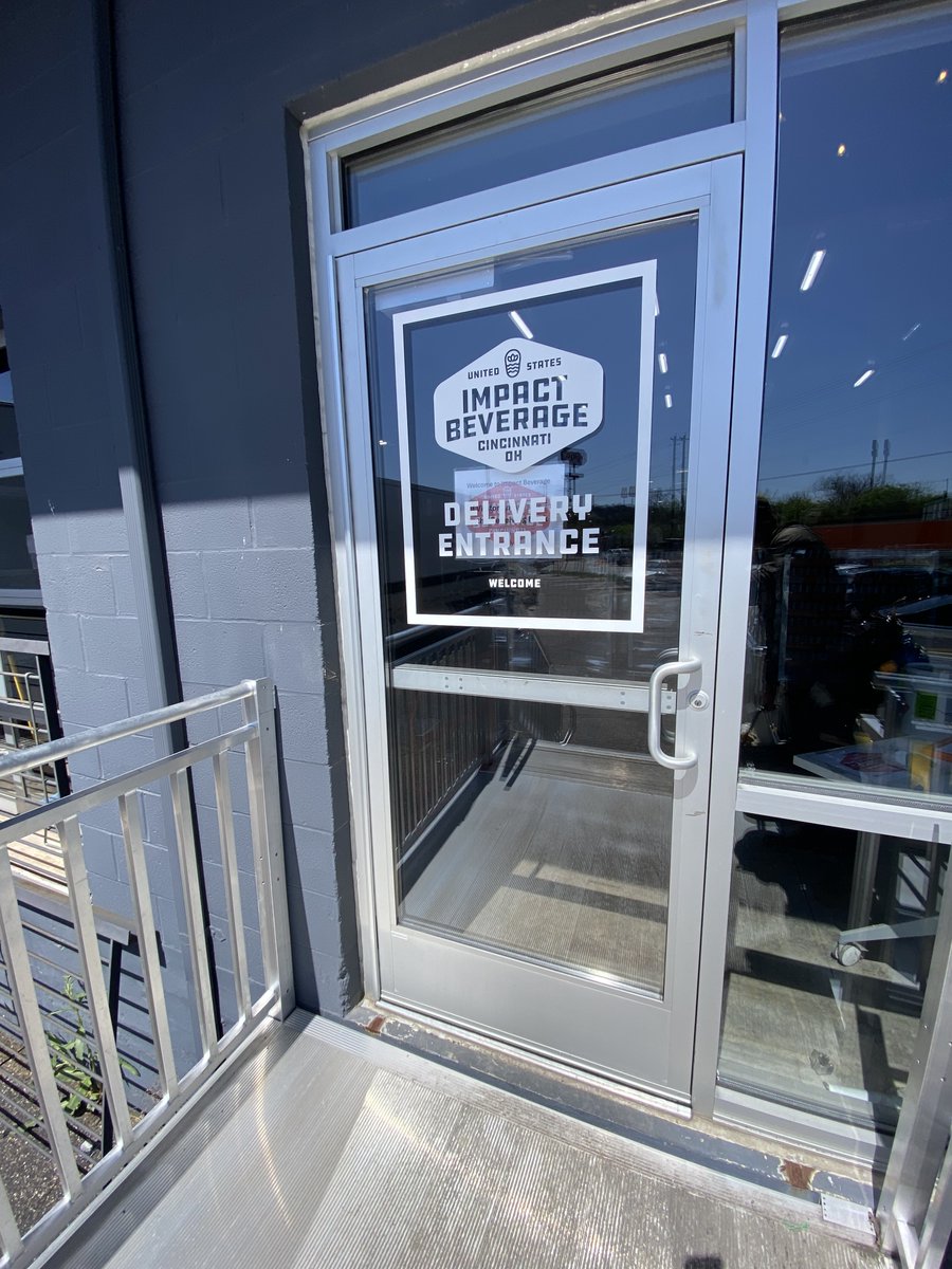 White vinyl on glass is an effective way to add branding or wayfinding for guests. We produced and installed this custom graphic for Impact Beverage to help direct delivery drivers when they arrive on site. 💡Need to customize your door or window? Drop us a line to get started!