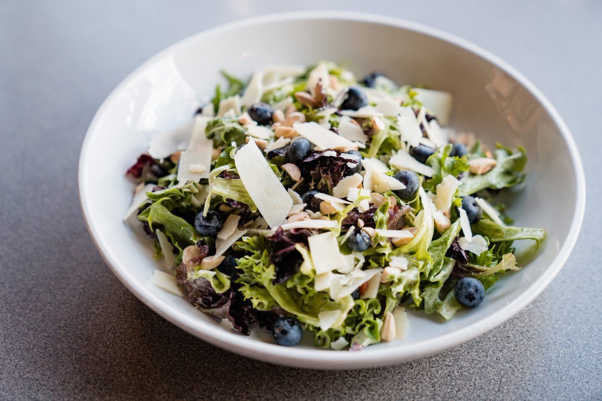 Blueberry bliss. 🫐 That's right, our Blueberry Almond salad is back for a limited time! Order now at deweyspizza.com