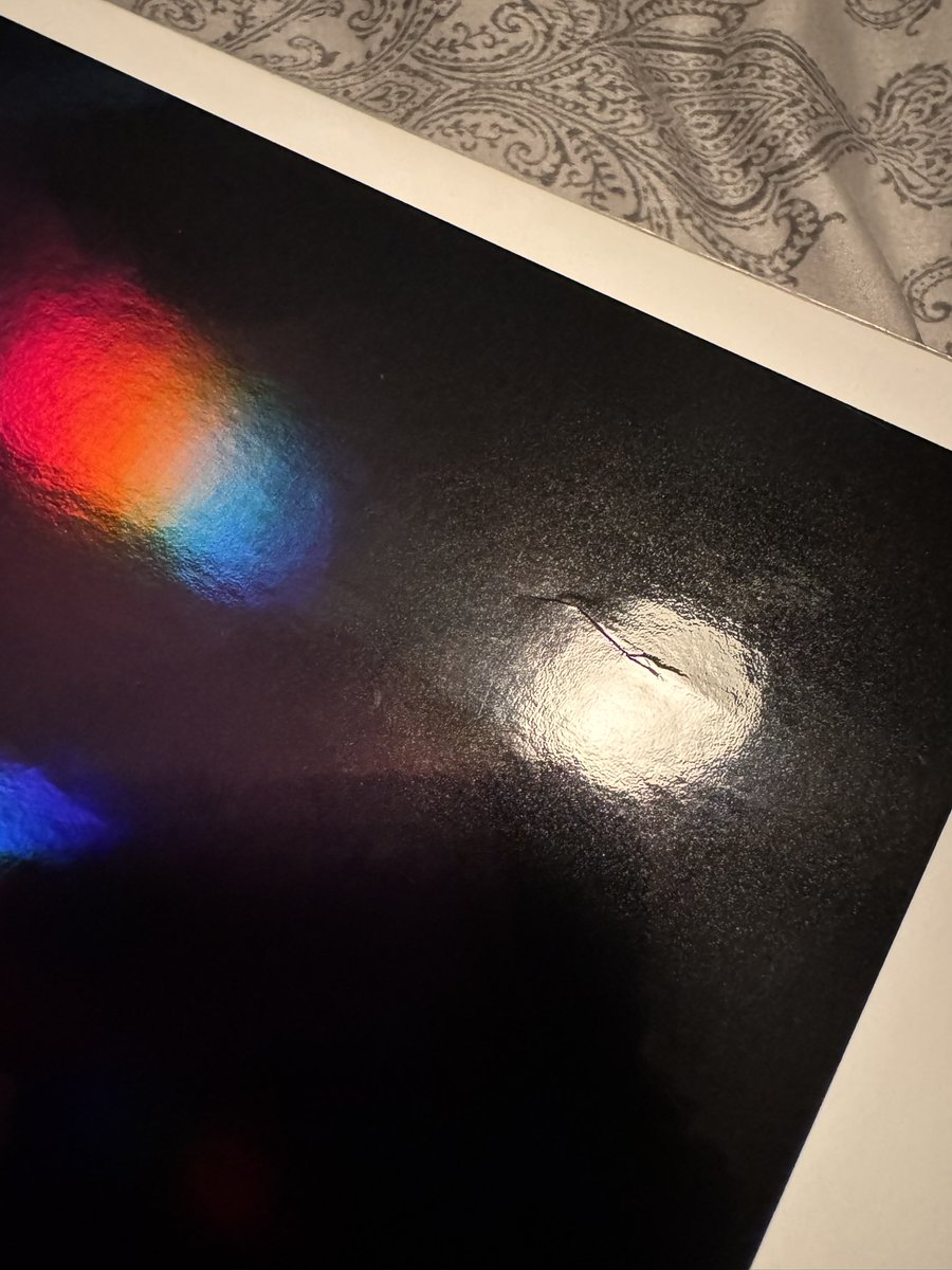 Opened a <a href="/veefriends/">VeeFriends</a> comic and got a /99 holofoil. It came creased though.
