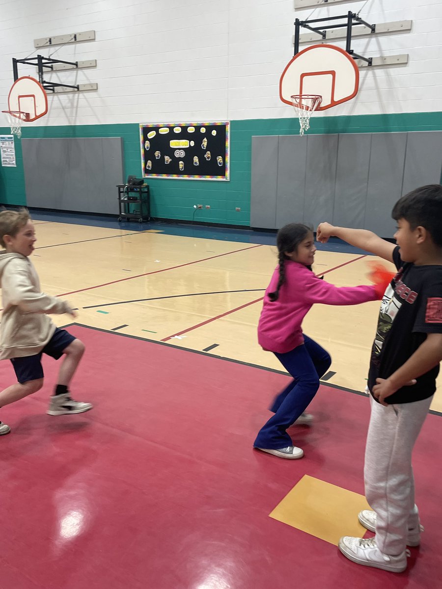 BoPhillips10's tweet photo. Bandiera or Flag in Italian is a fun chasing and fleeing game. Students have to be quick to react when their # is called. It’s a race to get the flag back safely to your spot or tag the opponent before they return the flag. #Physed -#GlobalPE #D59PE @MrsMetcalf_PE @D59SaltCreek https://t.co/1W6Y3c1Hg9