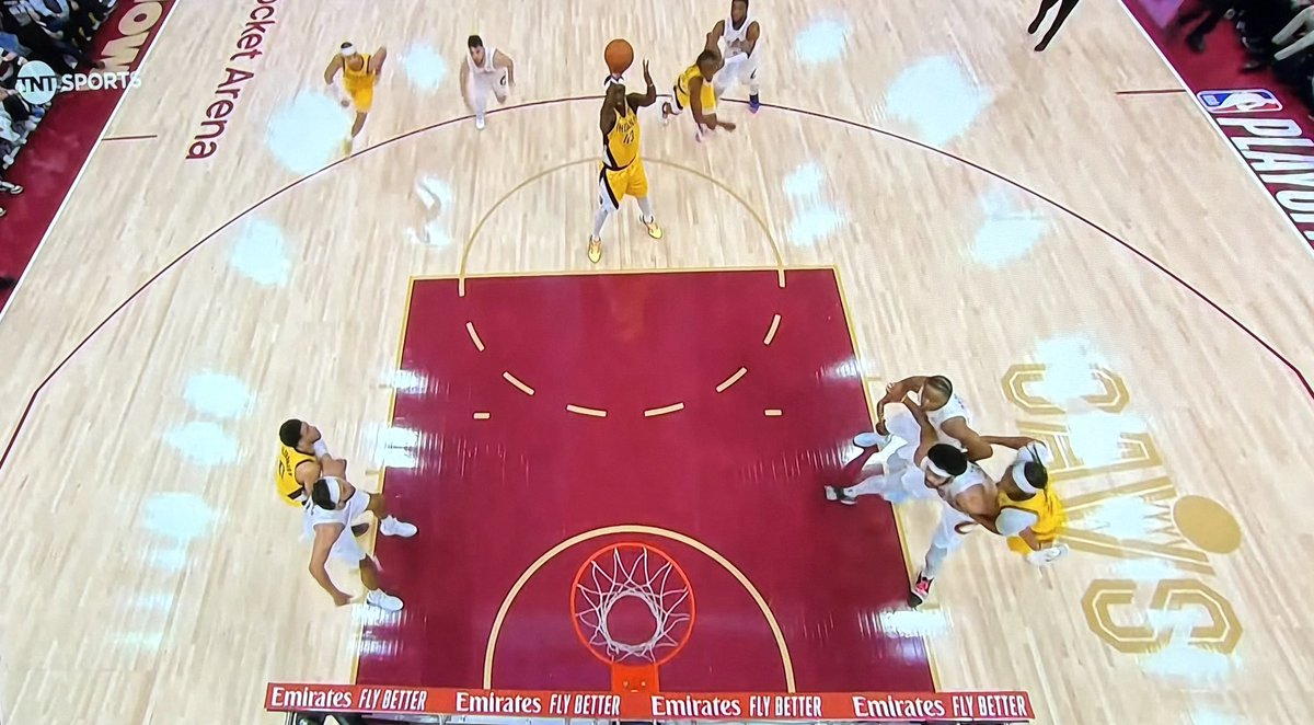 Huh…

“During free throw attempts, players positioned above the three-point line must remain outside the arc until after the ball has been released by the shooter.”
