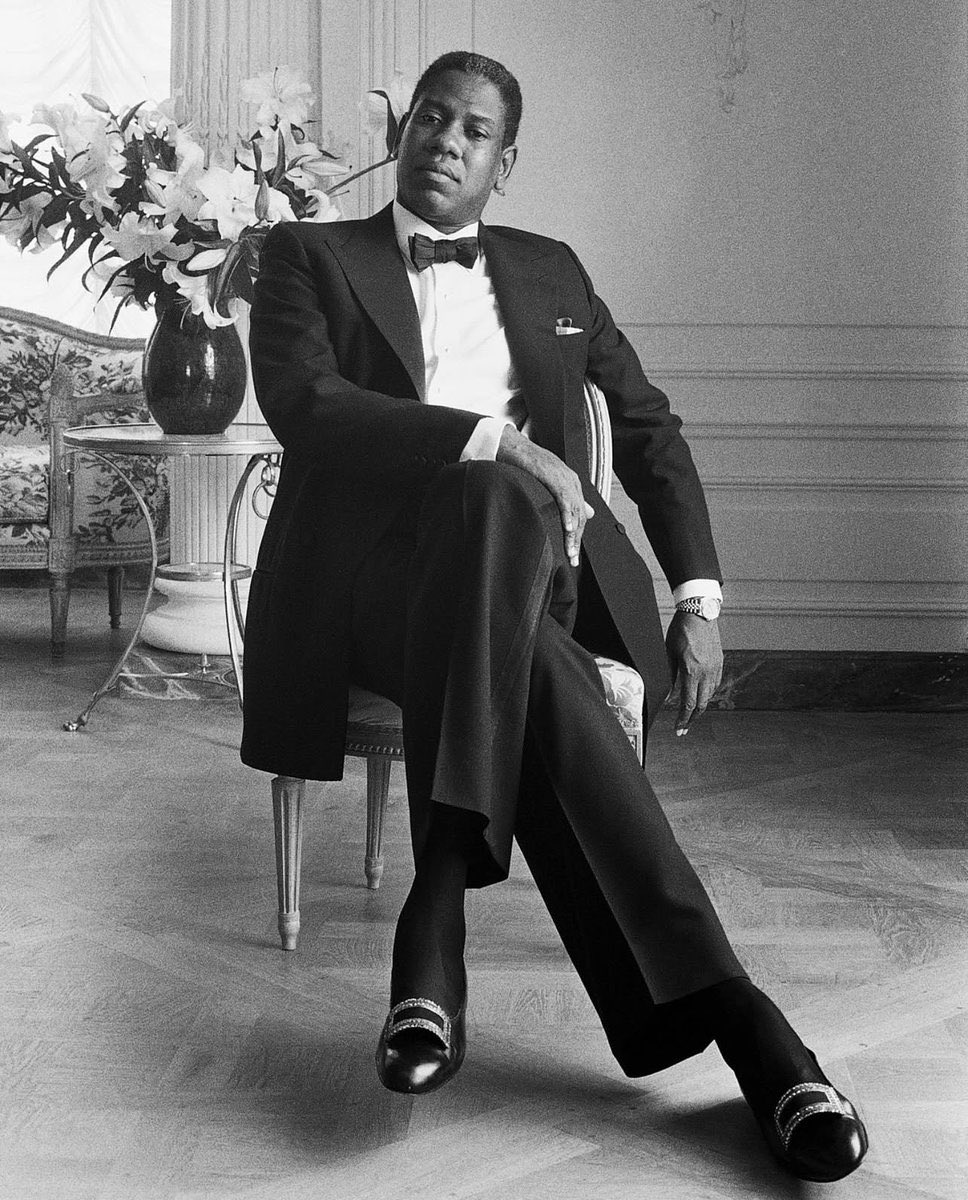 Laura Harrier in Gap Studio by Zac Posen featuring an image of the late André Leon Talley: