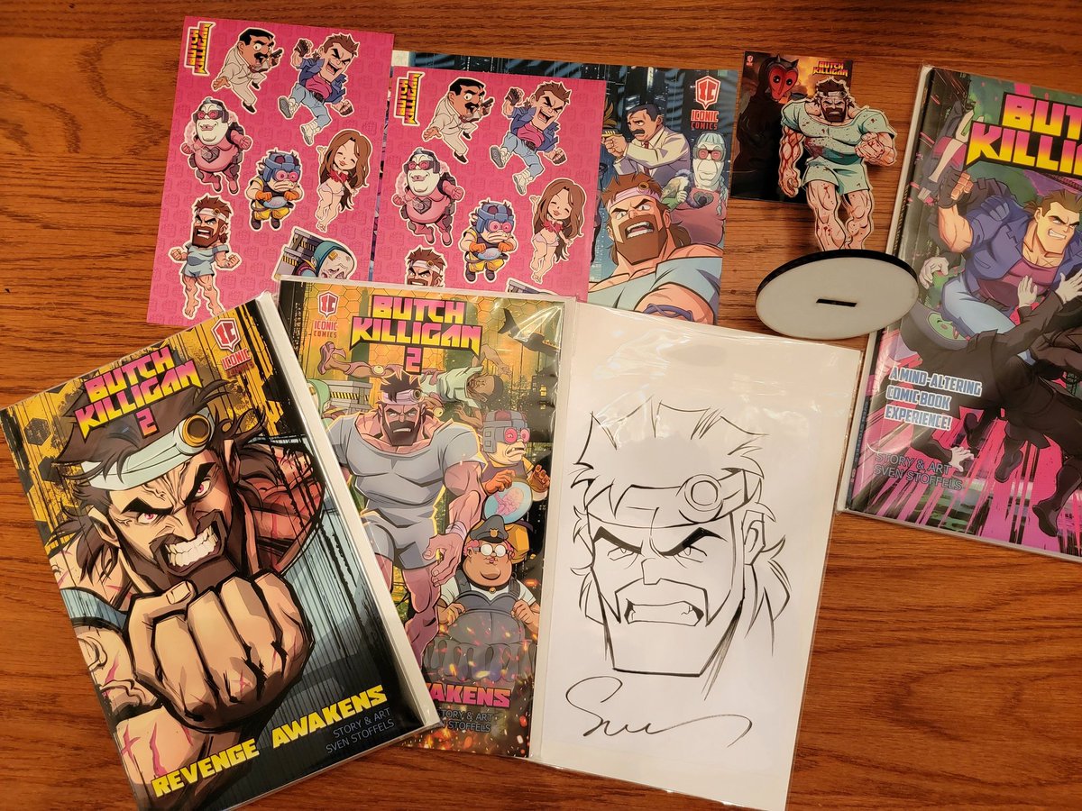 MavoftheDead's tweet image. Got my haul of @Butchkilligan
 books and more from the brilliant mind of @svenstoffels! Butch Killigan 2: Revenge Awakens is a wild, chaotic cyberpunk ride I couldn&apos;t put down. It tears through the degenerate, dystopia of Ultra City with relentless energy. Sven never disappoints!