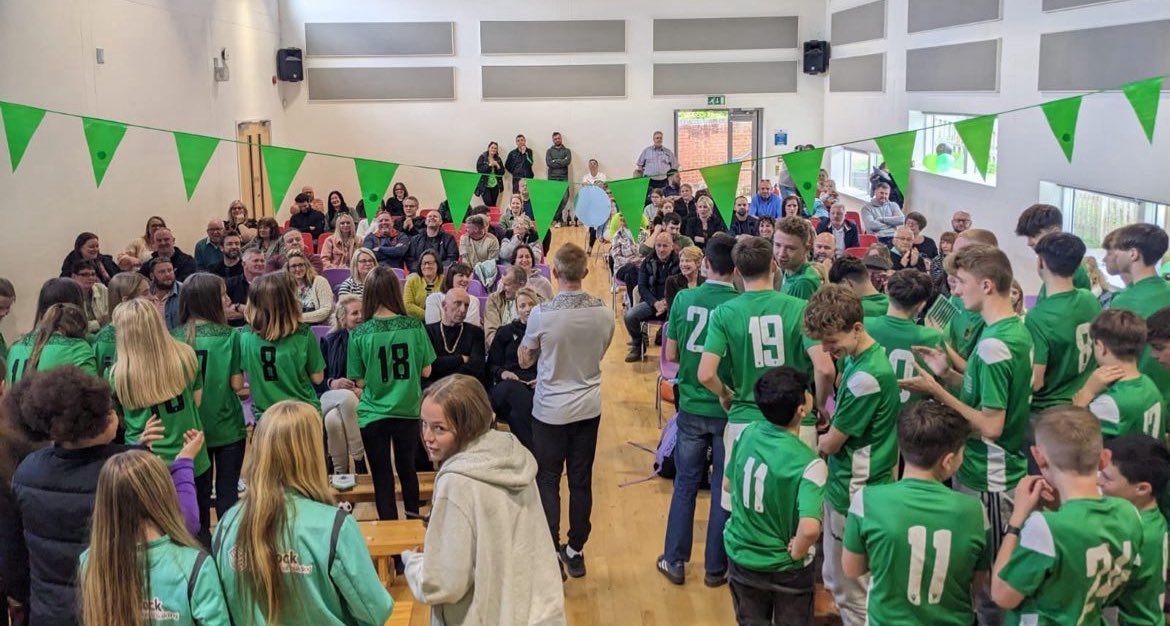 Moment #12

Our first presentation awards to our last! Started with no hall, no balloons, no chairs, just everyone gathered under a tree. And then we built it to this!