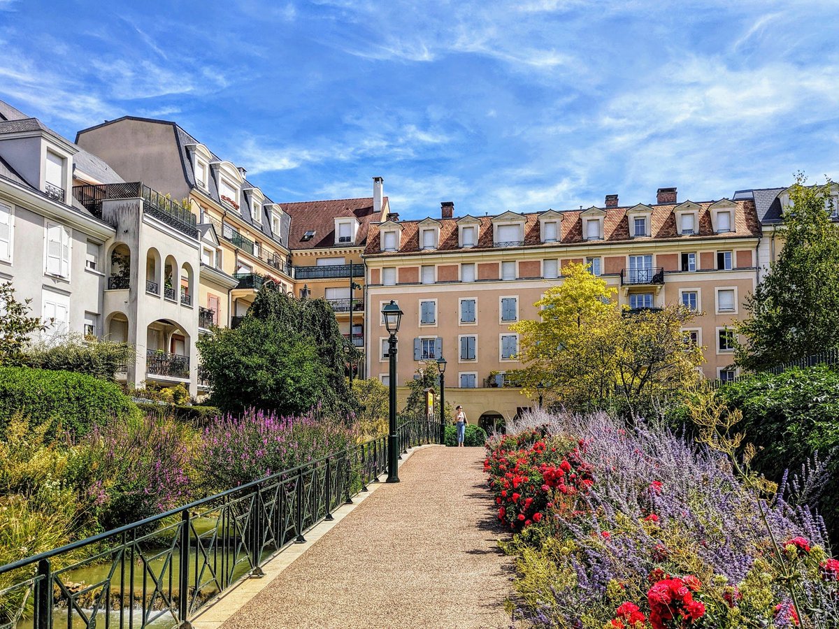 Recently finished in Le Plessis-Robinson near Paris. This is a social housing renewal scheme, replacing decayed postwar blocks with mixed-tenure and mixed-use development at much higher densities.