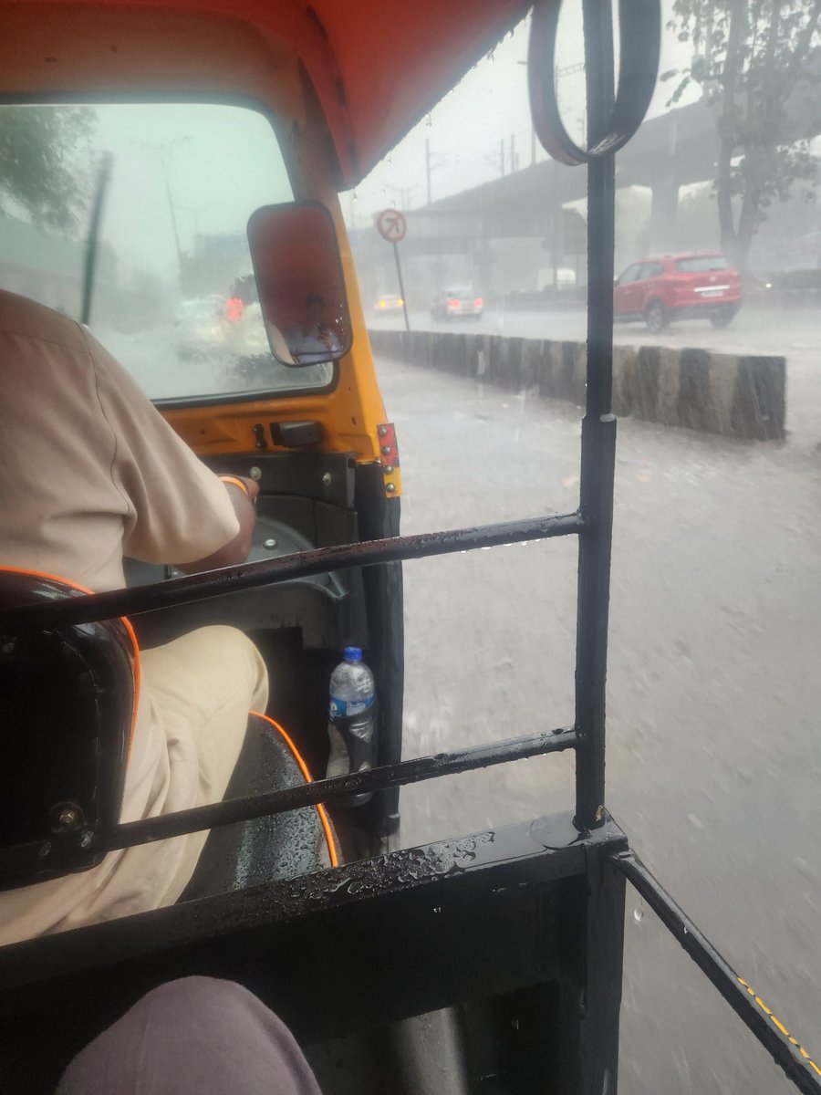 Beautiful first rains in Mumbai. Partly drenched in an auto and loving it.
