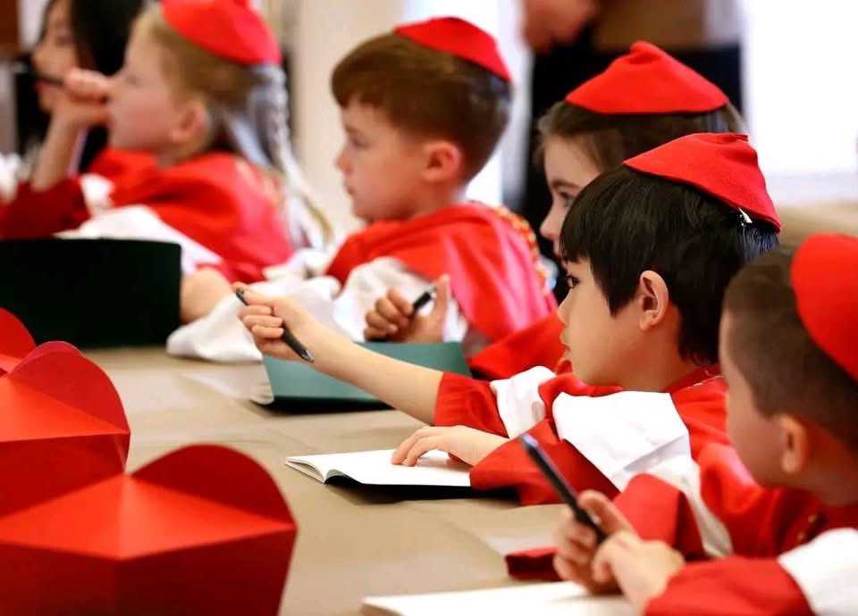 Students at Mt. Carmel (Chicago) learning about the process of electing a pope by staging a mock conclave. 🧵
