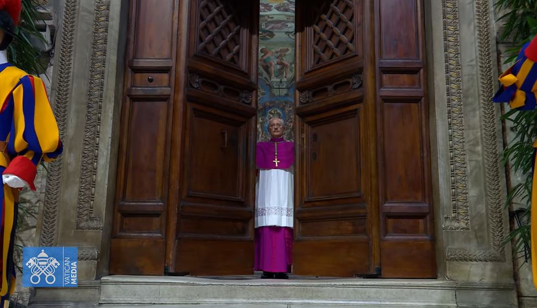 Archbishop Diego Ravelli says, "Extra omnes," (everyone out), the choir leaves, Vatican Media leaves, the priests assisting leave. And the door closes with a thud.