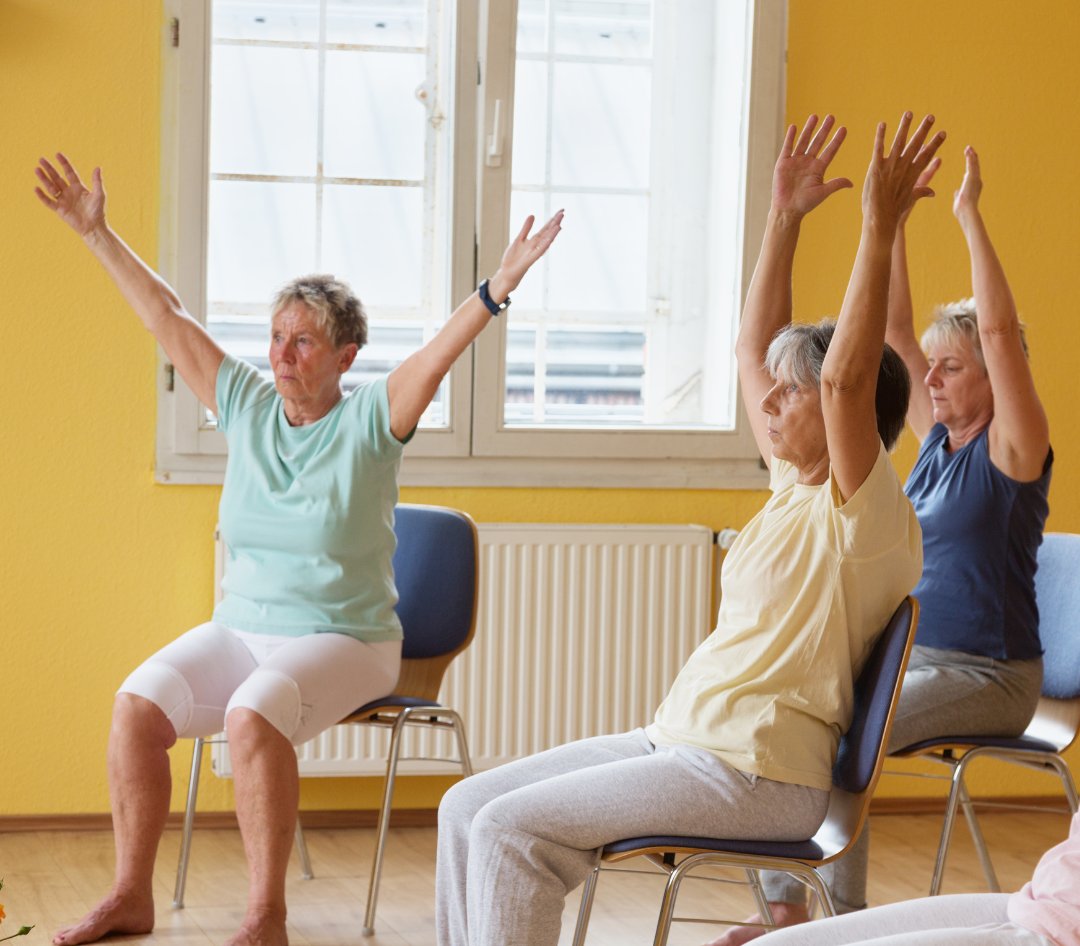Looking for a gentle new activity to add to your list? Chair yoga is a gentle and accessible way to move and reset your mind! Perfect for seniors or anyone needing a low impact option. #ChairYoga #MentalWellbeing #RxTGA