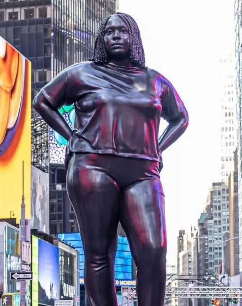 BREAKING - The statue of a 12 foot “plus size” African American woman has been erected in the middle of Time Square.