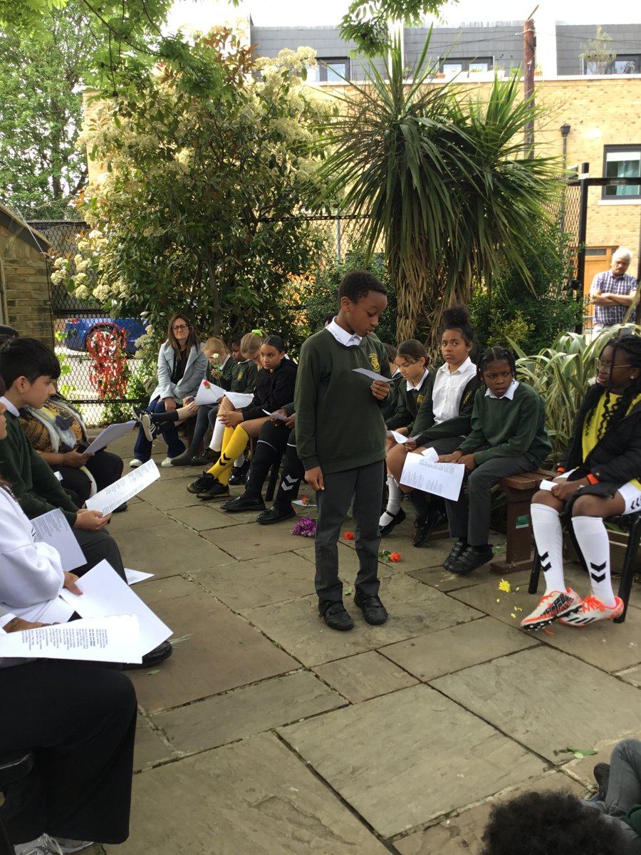 This afternoon, the children at STJ crowned our blessed Mother &amp; placed the gown around her shoulders, celebrating the month of Mary.  The children read beautifully, and layed flowers around the statue. #monthofmary #motherofjesus #mary