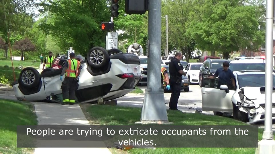 A rollover crash along the 3100 block of Grand Avenue in Des Moines Wednesday morning. Occupants were alert, conscious and breathing, police say. youtu.be/DYIfvyRJcpc