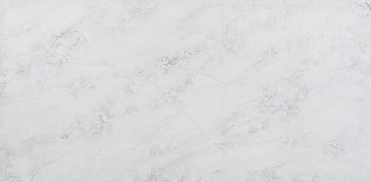 Nuvolato, with its white background and soft blend of gray and warm tones, reflects the timeless beauty of Italian marble, creating a serene and inviting atmosphere. When paired with light woods, beige hues, and gold or silver hardware, it results in a balanced and stylish space