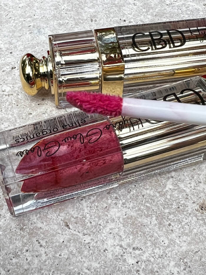 Nourish your #lips with #CBD Hydro Glow Gloss #lipstick. Made w/ organic, #nontoxic ingredients, it's a must-have on your #beauty counter! White truffle makes this #makeup #lip gloss an epicenter of bursting health. #menopause #women #healthyliving #skin  bit.ly/3HWu617