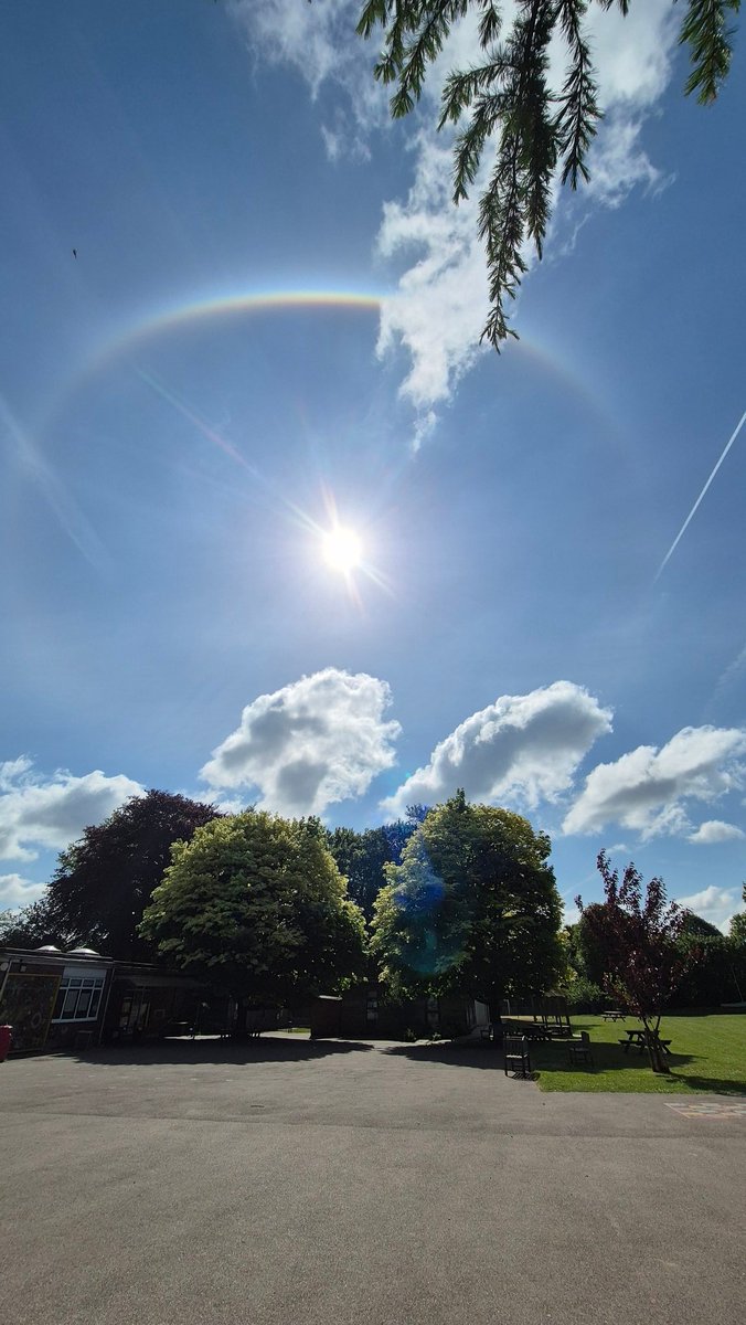 Today Foundation alerted Miss Morris to a beautiful 'rainbow' around the sun. Mrs Hawker &amp;  Miss Morris had a little Google ... 

A phenomenon caused by the refraction and reflection of sunlight through ice crystals in the upper atmosphere. It really was beautiful.

#rainbow
