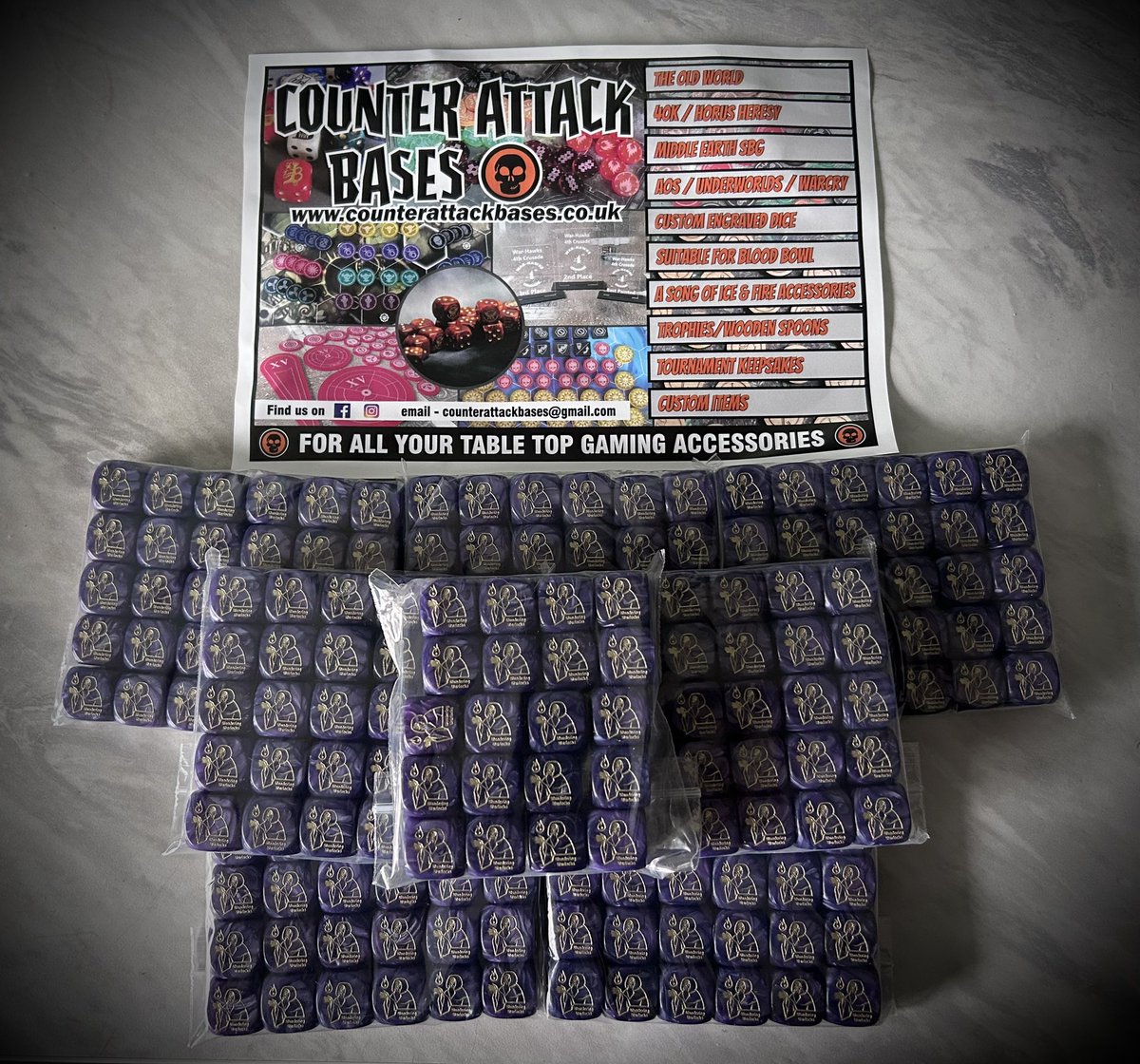 Who doesn’t like event swag! Players attending our weekend event in July will get a couple of our new club dice! As well as other really useful swag! 
Thank you to counter attack bases! 
Tickets are still available for our event on 19/20th July! Get in touch for more info 👌😁