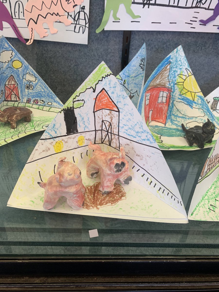 2nd grade Animal Figurines in 3D paper habitat.