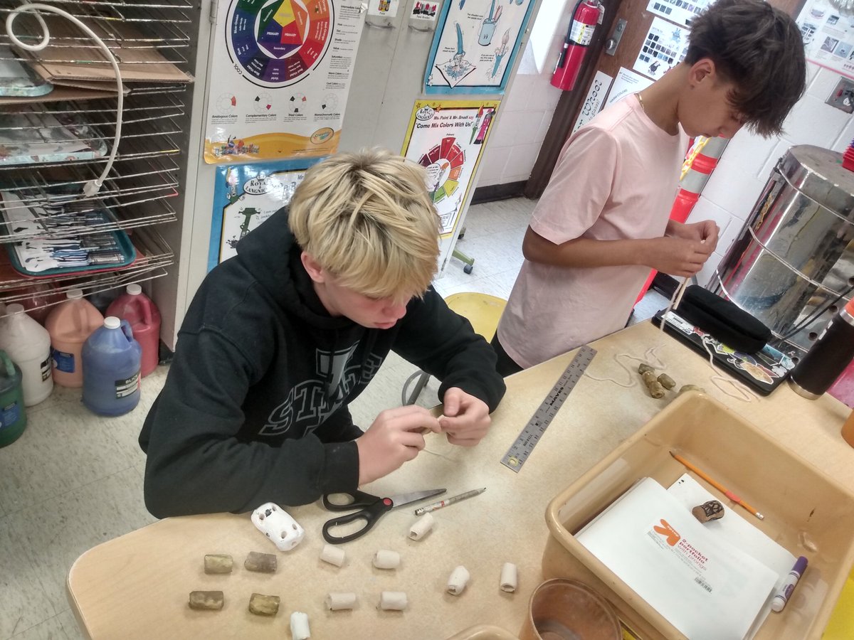 Stringing together our painted Clay Marionette pieces in 6th grade Art! <a href="/D13Warriors/">Westfield School</a> #ilbsd13