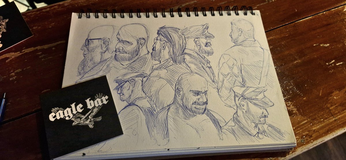 A few leather men at the eagle bar