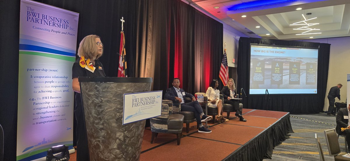 Howard County Tourism's Amamda Hof takes the floor at the BWI Business Partnership's Signature Breakfast, which features a panel discussion of area tourism officials.  The event is underway at the BWI Airport Marriott.