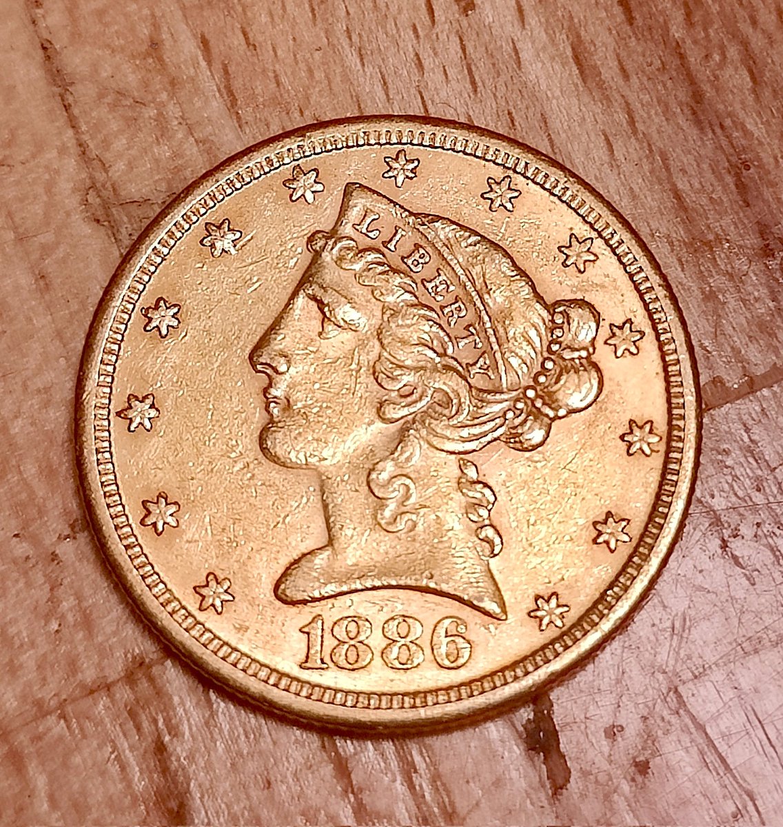 GreyBear777's tweet photo. I'm still collecting even at this time. 1886 five dollar Liberty head gold coin.  
#investing #GOLD #numismatics #money #coins #pre33 https://t.co/OiMQeKdigz