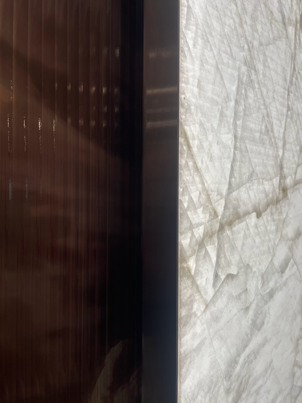 Tlawrence07's tweet image. Some projects speak in subtlety, where beauty hides in #MaterialLayering.  @Marriott Las Vegas, a reception feature blends mirrored &amp;amp; textured art glass, abstract graphics, and #BacklitStone for an ethereal, modern feel. @GPIDesign put in expert coordination to make it happen.