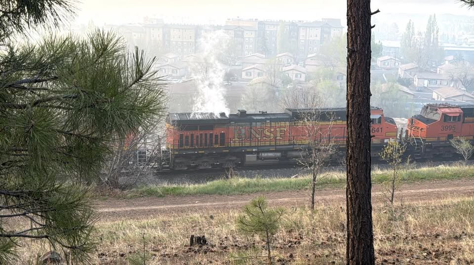 The is no fire. A train engine overheated near Fimbrez Estates in west Flagstaff and the systems on the train prevented the fire. The Flagstaff Fire Department is there monitoring the situation. They recommend staying inside and out of the smoke if you are nearby.