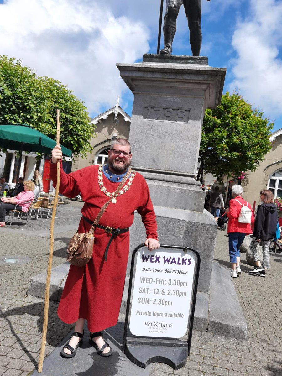 Wexford historical tour guide, Paul Walsh from 'Wex Walks' is pictured standing beside his former 'shop front'... his now-banned sandwich board.