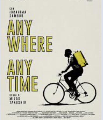 Me last week at Porto Palazzo market, Turin, alongside a poster for 'Any Where, Any Time', opening scenes filmed there, the story of a Senegalese immigrant struggling to get by.  Humbling to remember that three generations ago my own family went from Connemara to America.  X