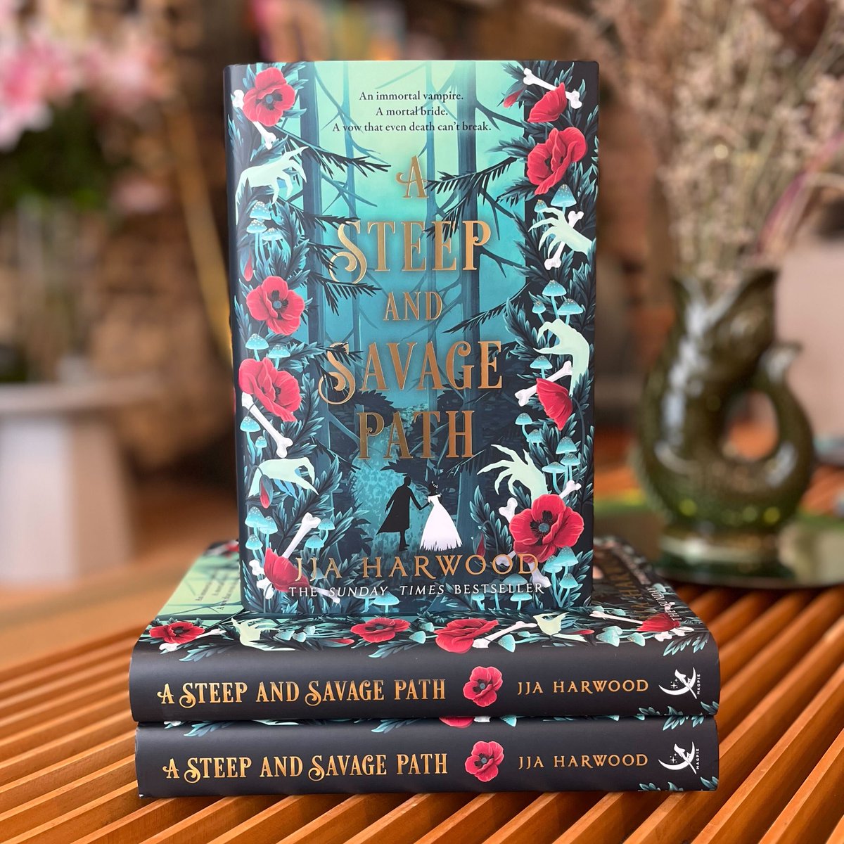 MMLitAgency's tweet photo. We could say “I do” to #JJAHarwood’s fantasy romance, #ASteepAndSavagePath which publishes with @HarperVoyagerUK today in this gorgeous hardback ❤️
An immortal vampire. A mortal bride. A vow that even death can’t break. On a perilous journey between the land of the living and the dead, Irina and Stefan are faced with an impossible choice. Will they be able to make it out undead or alive?🦴