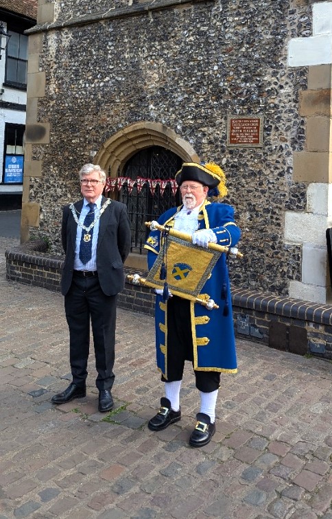 The Mayor, Cllr Jamie Day, and the Town Cryer, Steve Potter, announcing Victory Day in Europe in front of the Clocktower, St Albans  - the 80th anniversary.
