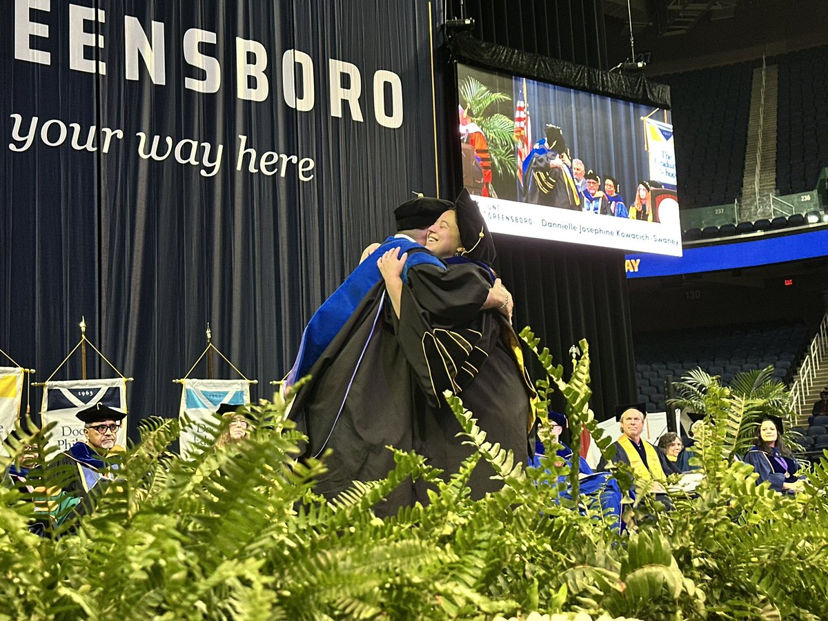 UNCG's tweet photo. Excited to kick off the commencement season by awarding over 700 master’s and doctoral degrees!

“You’ve proven to yourself and your loved ones that you’re up to the challenge.” -@UNCGChancellor 
#UNCGGrad #UNCGWay https://t.co/yo7ukLJ0ve