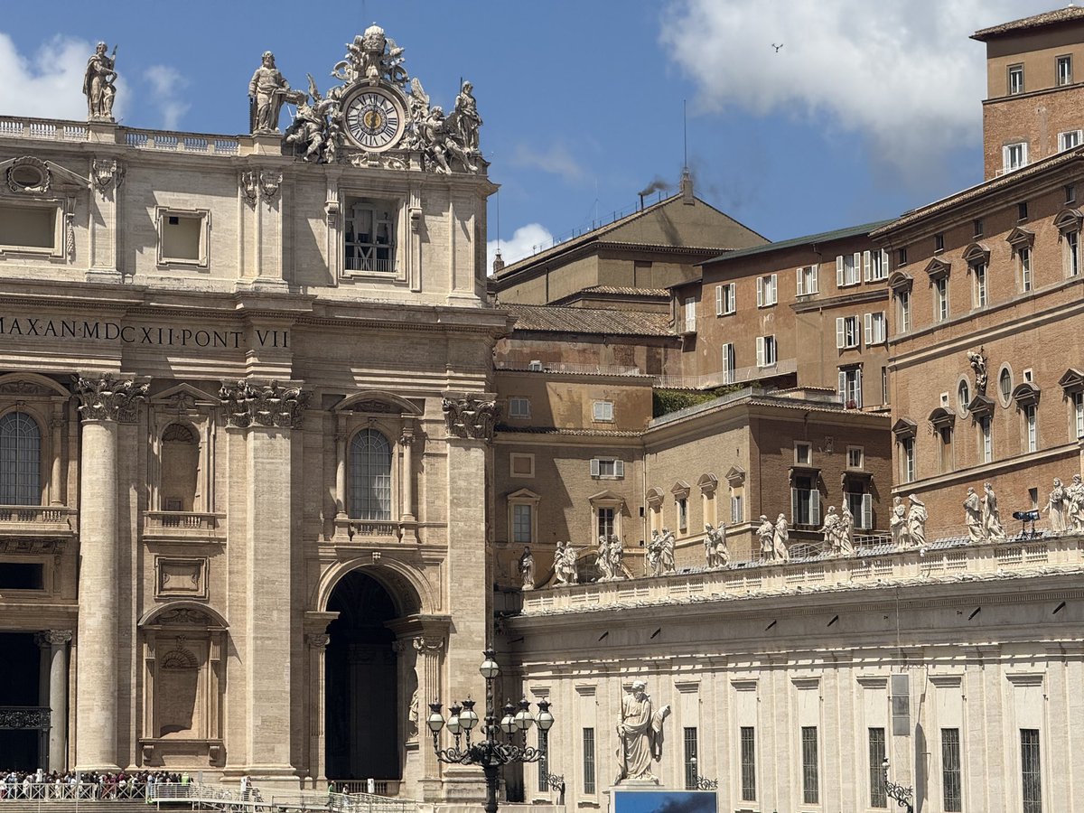 We’re sharing the space with some 80,000 in the heat &amp; cold, but humors are good &amp; spirits are friendly. There is a strong and loud reaction as soon as the smoke is visible. If this is the reaction to black smoke, I can’t wait  to see what happens when it’s white!  Stay tuned!