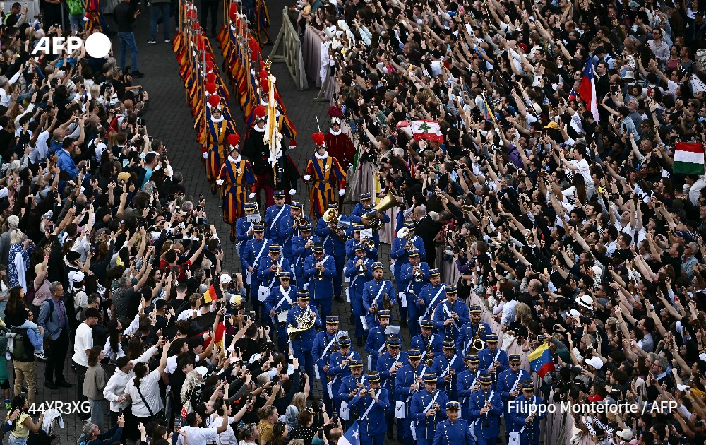 Reactions in St Peter's Square after election of new pope confirmed by white smoke <a href="/AFPphoto/">AFP Photo</a>